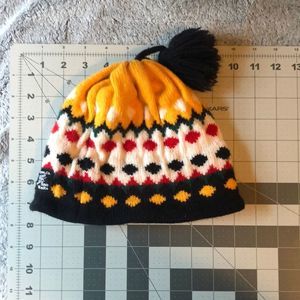 Kid’s beanie Aspen Co. Sno Knits navy, yellow, cream, and red